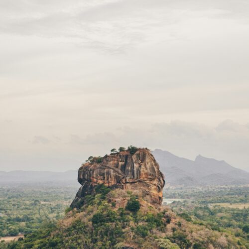 Sigiriya Rock Fortress surrounded by greenery