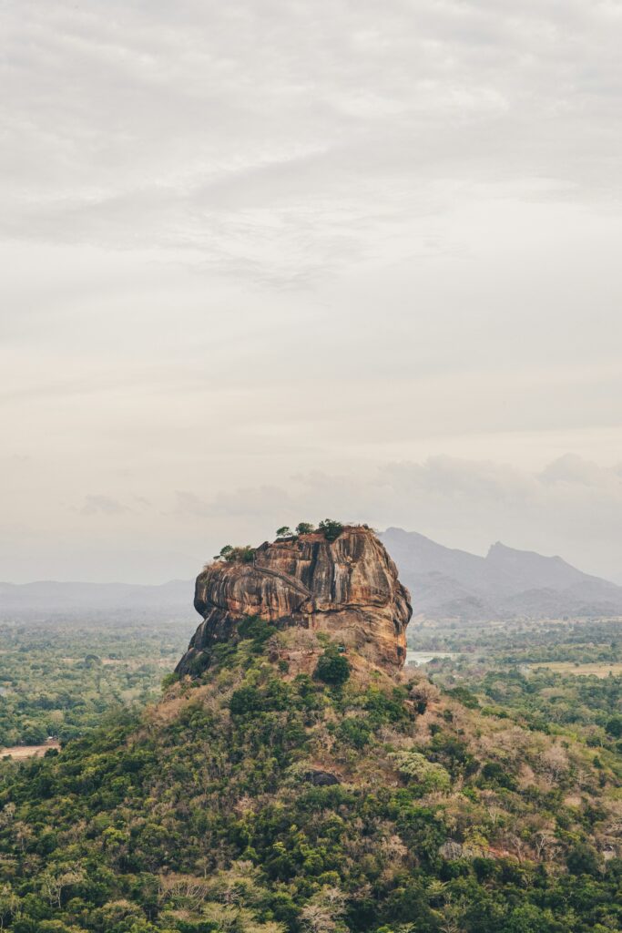 Sigiriya Rock Fortress surrounded by greenery