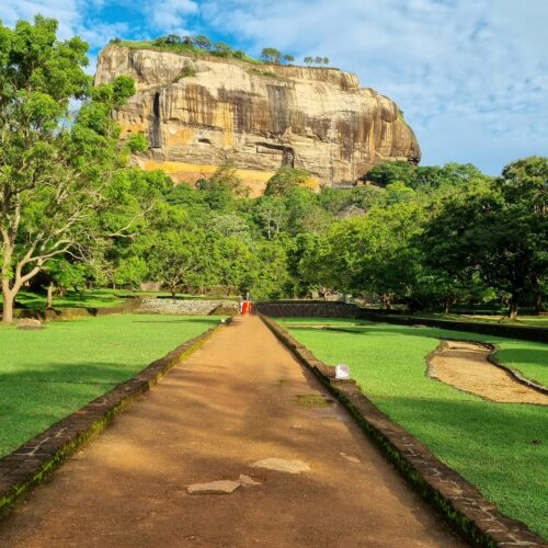 Sigiriya Rock Fortress surrounded by greenery